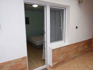 A bed or beds in a room at Apartments in Siofok - Balaton 35627