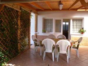 A seating area at Apartments in Siofok - Balaton 35627 Még 28 kép