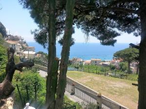 a view of the ocean from a park at Casa Vacanze Bouganvillea in Cetara