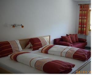 Postel nebo postele na pokoji v ubytování Ferienhaus Zillertal