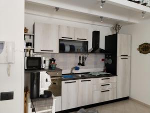 A kitchen or kitchenette at Sol&Luna 1909 Tourist Location in Old Town