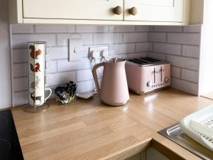 a kitchen counter with a mixer and a toaster at Westerley - Uk31573 in Clifford