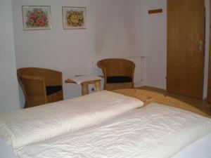 Cama ou camas em um quarto em Haus Straninger