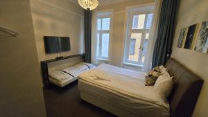 Postel nebo postele na pokoji v ubytování Hotel Hötorget