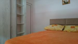 Una cama o camas en una habitación de Apartments Vukovic