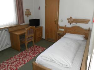 En eller flere senge i et værelse på Hotel Rauchfang