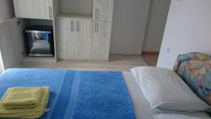 Una cama o camas en una habitación de Apartments Vukovic
