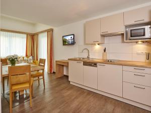 Kuchyňa alebo kuchynka v ubytovaní Appartement Gästehaus Bergkristall