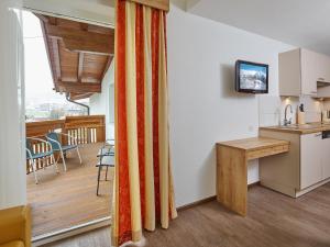 Kuchyň nebo kuchyňský kout v ubytování Appartement Gästehaus Bergkristall