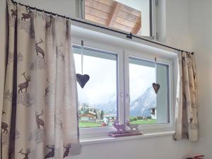 Nespecifikovaný výhled na hory nebo výhled na hory při pohledu z apartmánu