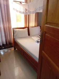 Postel nebo postele na pokoji v ubytování Rm Hotel