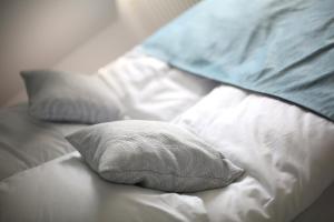 Posteľ alebo postele v izbe v ubytovaní Pure Apartments Kraków