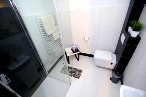 Kúpeľňa v ubytovaní Pure Apartments Kraków