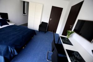 Posteľ alebo postele v izbe v ubytovaní Pure Apartments Kraków