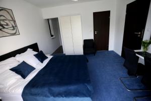 Posteľ alebo postele v izbe v ubytovaní Pure Apartments Kraków