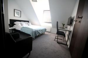 Posteľ alebo postele v izbe v ubytovaní Pure Apartments Kraków