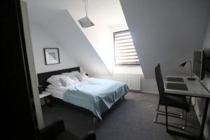 Posteľ alebo postele v izbe v ubytovaní Pure Apartments Kraków