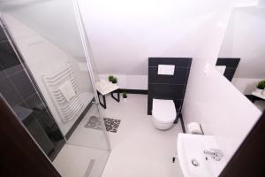 Kúpeľňa v ubytovaní Pure Apartments Kraków