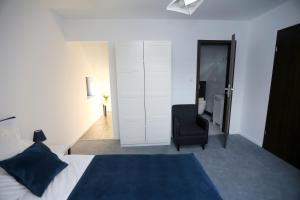 Posteľ alebo postele v izbe v ubytovaní Pure Apartments Kraków