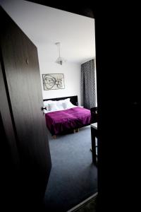 Posteľ alebo postele v izbe v ubytovaní Pure Apartments Kraków
