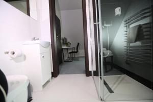 Kúpeľňa v ubytovaní Pure Apartments Kraków