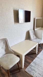 TV a/nebo společenská místnost v ubytování Villa Mandarina