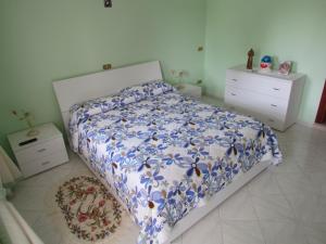 Ένα ή περισσότερα κρεβάτια σε δωμάτιο στο B&b Il Gheppio