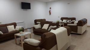 A seating area at Albergue O Trisquel