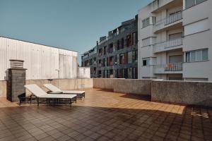 En balkon eller terrasse på Apartamentos Atlantis