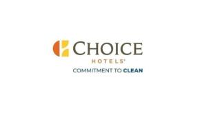 a logo for a choice hotels commitment to clean at Quality Inn & Suites Airport in Austin
