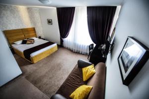 Postel nebo postele na pokoji v ubytování Coquette VILLA Mamaia Nord