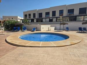 Πισίνα στο ή κοντά στο Acogedor Apartamento