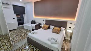 Posteľ alebo postele v izbe v ubytovaní Angel's Care B&B