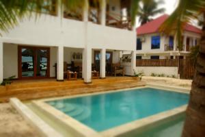 Πισίνα στο ή κοντά στο Amani Beach Villa