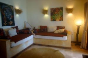 Χώρος καθιστικού στο Amani Beach Villa
