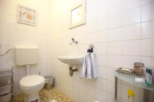 Koupelna v ubytování Prokonzul 2BR apartment in old town