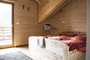 Postel nebo postele na pokoji v ubytování Rifugio Serot