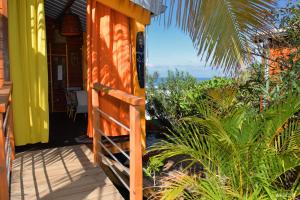 Zahrada ubytování Poz Lagon - chambre d'hôtes - Bungalow pour 2 personnes - Jacuzzi privatif - petit déjeuner - Vue sur le lagon
