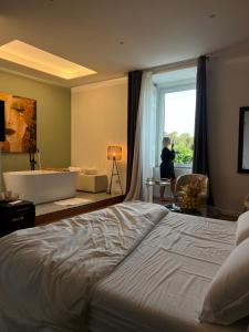 Postel nebo postele na pokoji v ubytování MareLuna Rooms