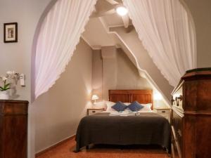 Postel nebo postele na pokoji v ubytování La Casa di Eio