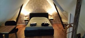 Postel nebo postele na pokoji v ubytování Wellness B&B Hartje Coevorden