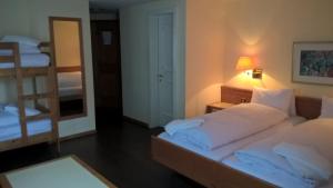 Postel nebo postele na pokoji v ubytování Albergo Faido