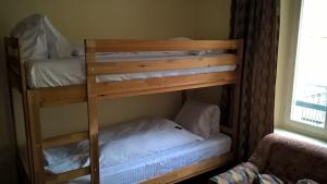 Postel nebo postele na pokoji v ubytování Albergo Faido