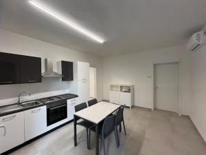 Η κουζίνα ή μικρή κουζίνα στο Casa Vacanza Conchiglia