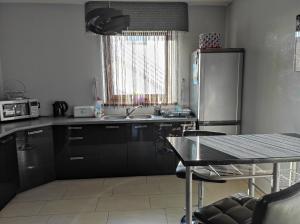 Kuchyň nebo kuchyňský kout v ubytování Apartament Perła Pienin