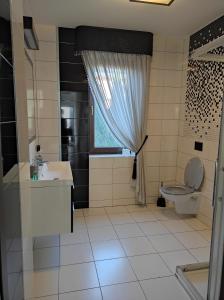 Koupelna v ubytování Apartament Perła Pienin