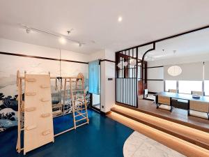a room with bunk beds and a dining room at youre at - Grand Setiabudhi Apartment in Bandung +187 photos