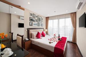 TV a/nebo společenská místnost v ubytování Golden Moon Suite Hotel & Travel
