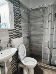 Koupelna v ubytování Aktaion Hotel