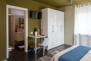 Postel nebo postele na pokoji v ubytování B&B Poli Opposti